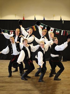 Eastern European folk dance performance in traditional costume